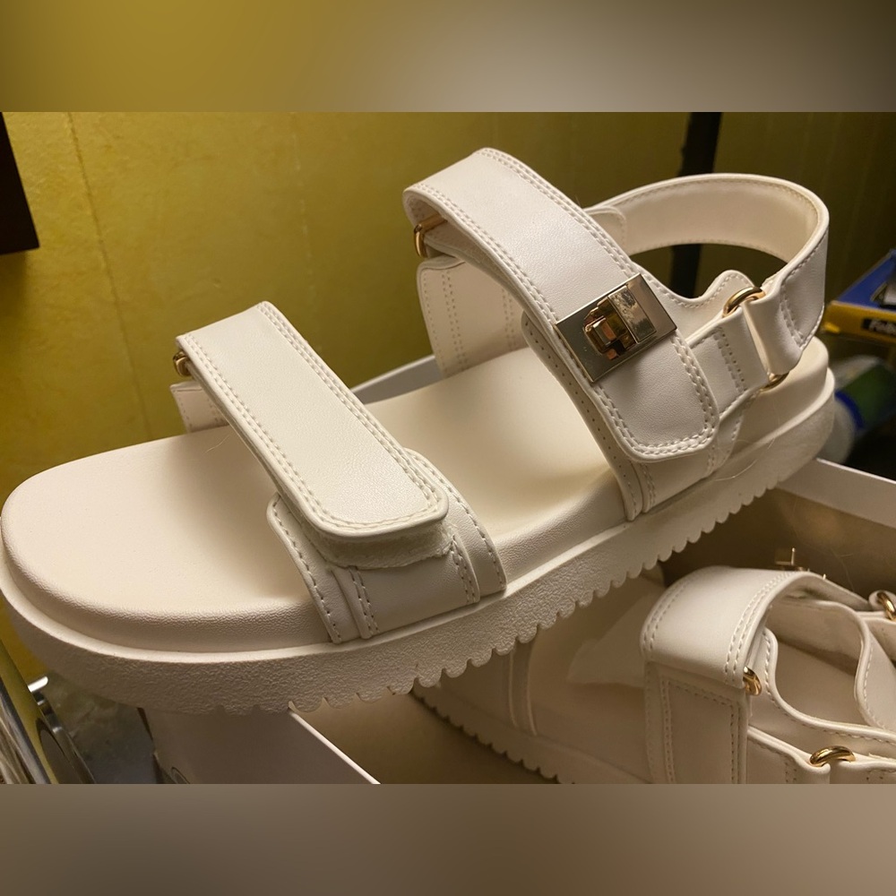 Women's 9.5 Jonie Ankle Strap Footbed
Sandals - A New Day™ White . like new.